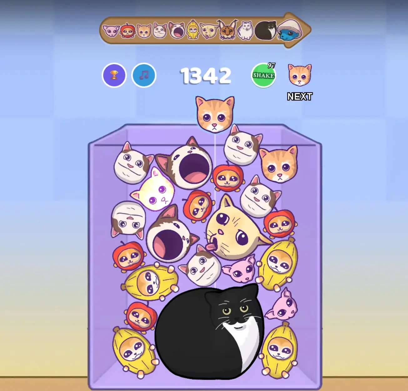Gameplay showing various cat evolution stages from basic kittens to rare mushroom-hat cats